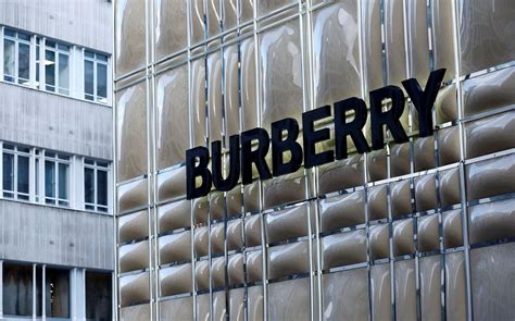 burberry axes profit.